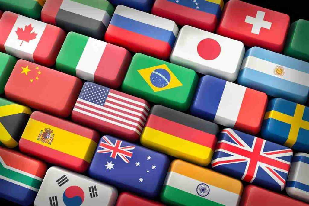 Assorted flags from various countries displayed together in a colourful keyboard.