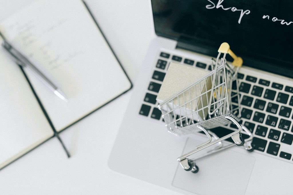 small shopping cart on a computer keyboard