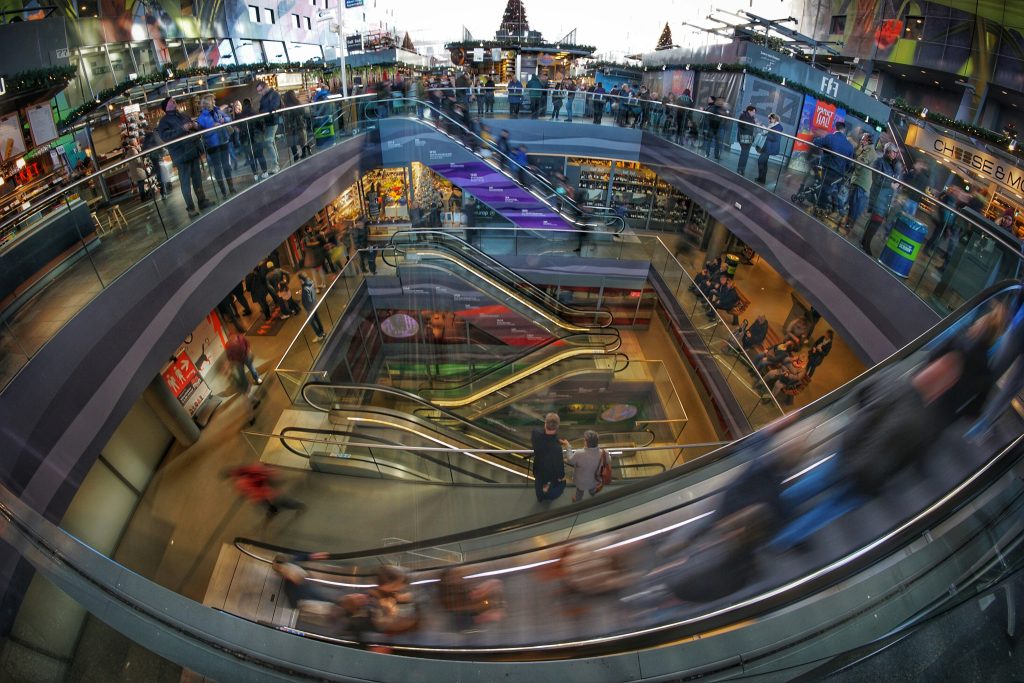 Image of a shopping mall with multiple staricases seen from above