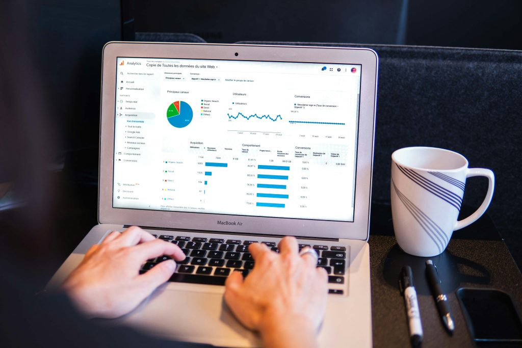 Person looking at Google Analytics on a personal computer