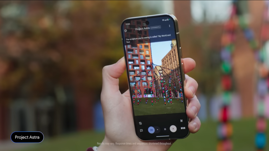 Person recording an art installation with a phone