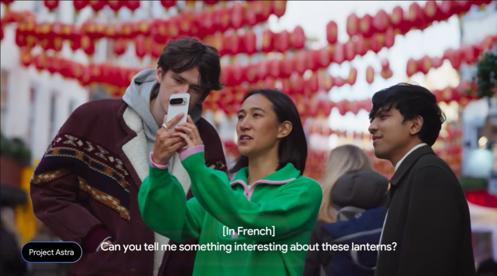 Three people looking at the phone in Chinatown