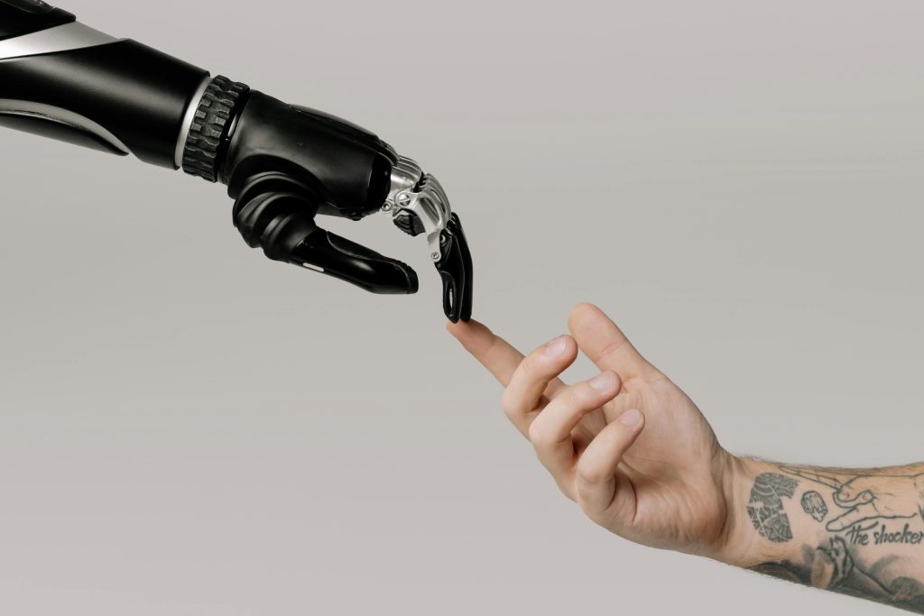 robot hand and normal hand